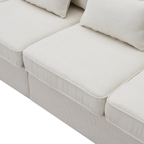 Minimalist linen sofa with armrest pockets and pillows, designed for modern comfort and style