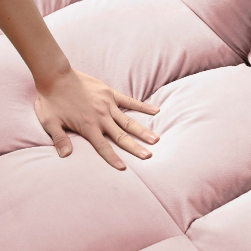 Modern velvet loveseat that transforms into a sleeper sofa with effortless luxury and versatility