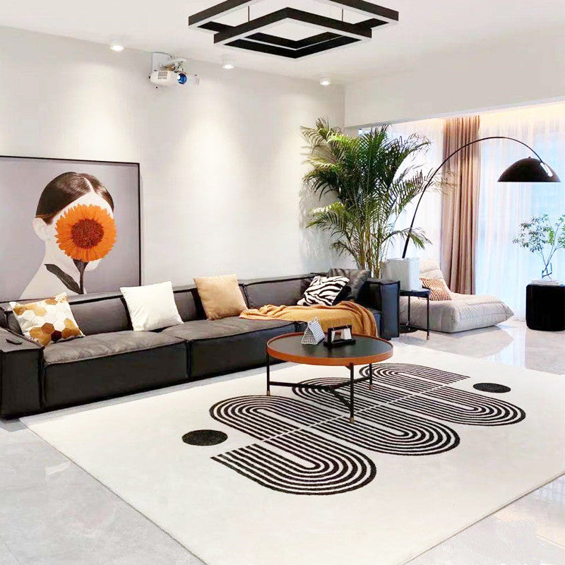 Statement rug that blends modern elegance with cozy sophistication