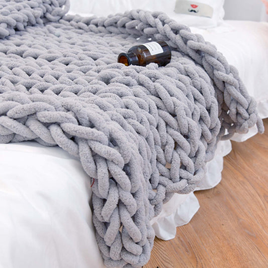 Handcrafted chenille sofa blanket, woven with chunky yarn for cozy luxury and modern style
