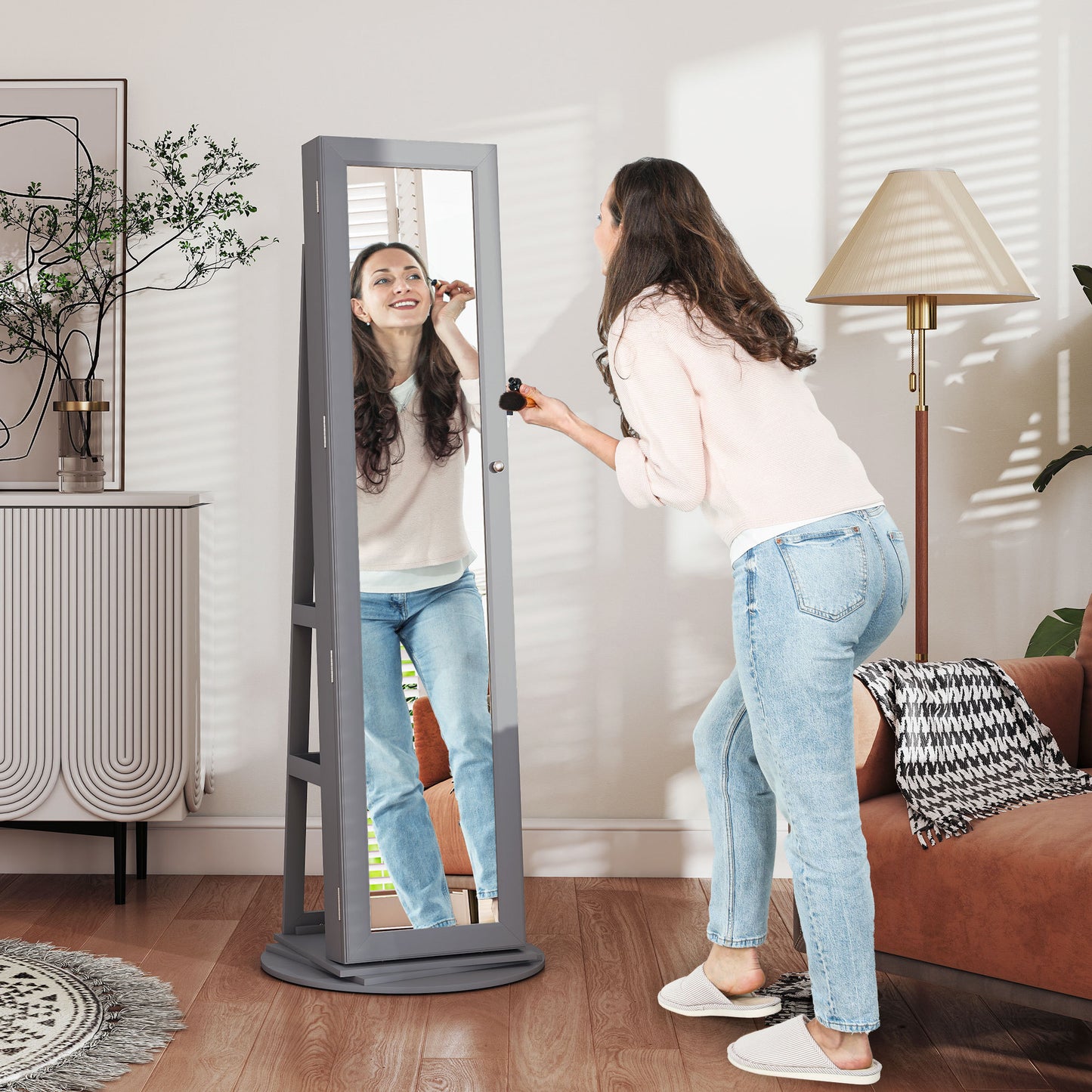 Sophisticated swivel armoire with mirror and lock, blending elegance with secure jewelry storage
