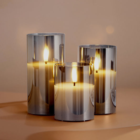 Create a warm, timeless ambiance with elegant flameless candles that glow with effortless sophistication